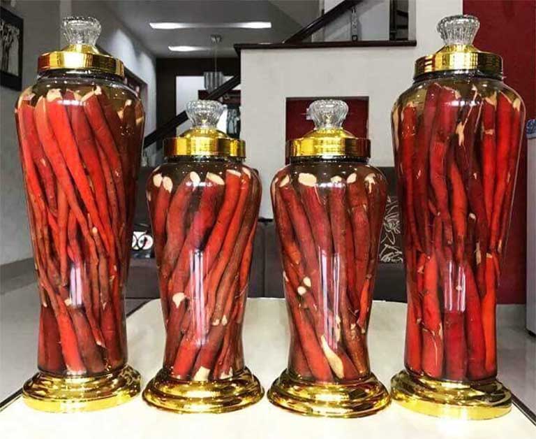 rượu rễ cau ngâm chữa yếu sinh lý