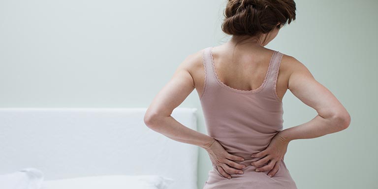 Đau lưng khi mới thụ thai là do đâu?